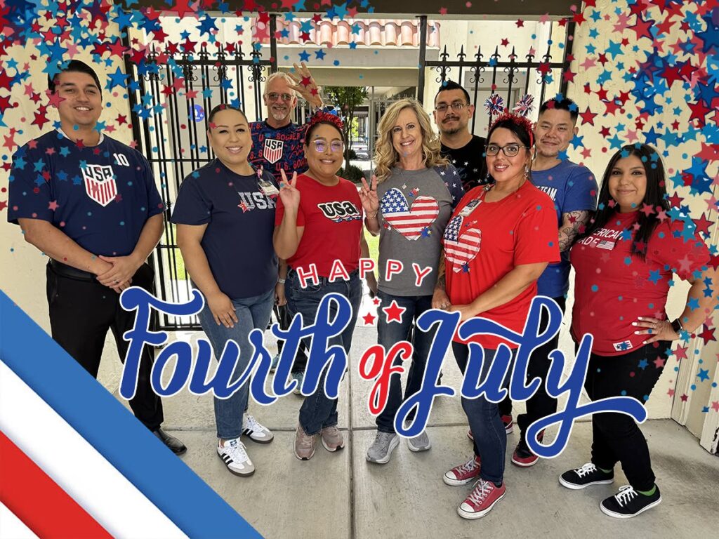 The team wearing red white and blue for July 4th.